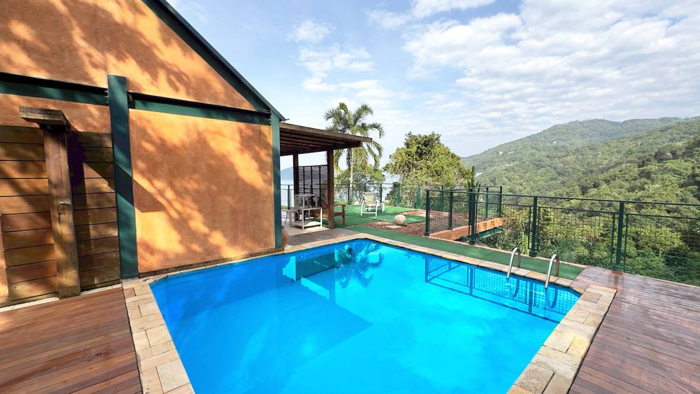 Casa à venda no Condomínio Iporanga Guarujá — Villa 438