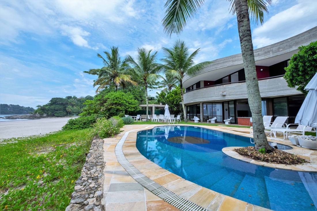 Casa Pé na Areia à venda no Condomínio Taguaíba Guarujá — Villa 392 | Projeto Ruy Ohtake