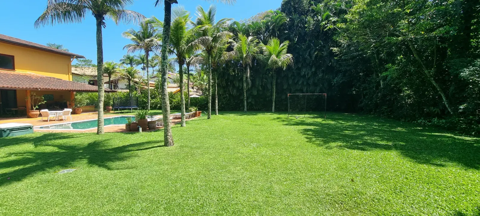 Área externa 16 — Iporanga, Guarujá, para locação, Casa