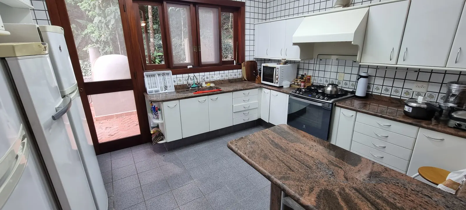 Área de serviço 1 — Iporanga, Guarujá, à venda e para locação, Casa