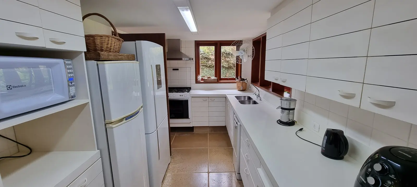 Área de serviço 1 — Iporanga, Guarujá, para temporada, Casa